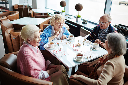 Elderly Playing Bingo in Their Free Time - lakwood home care services